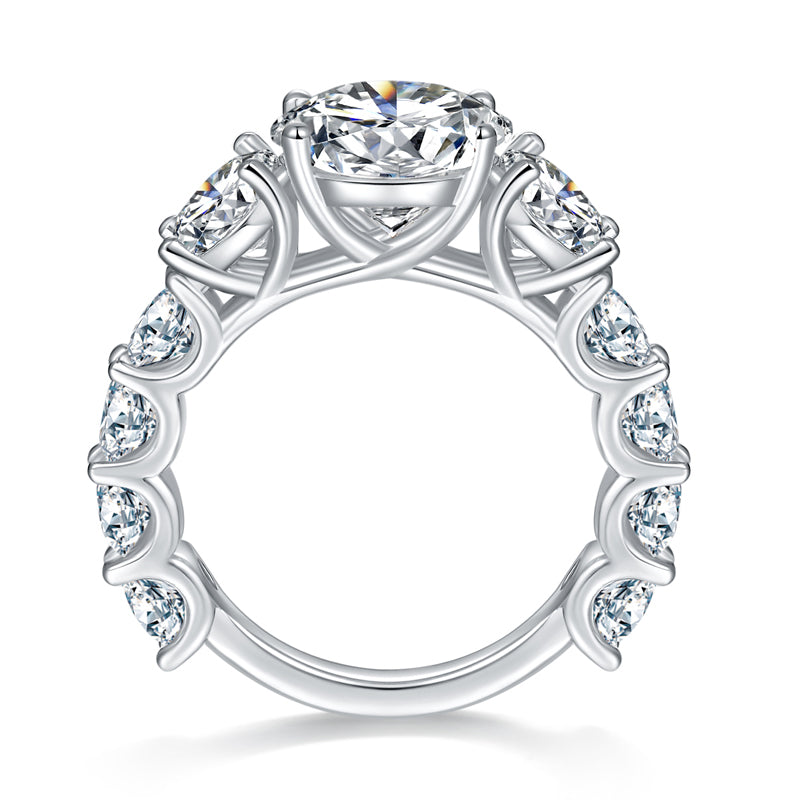 CARISSIE round moissanite solitaire ring, top-down view revealing the full band with symmetrical arrangement of stones and openwork design