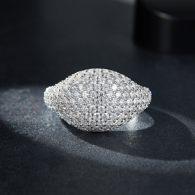 CARISSIE round moissanite pavé ring, top-down close-up revealing dense arrangement of tiny brilliant-cut stones