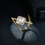 CARISSIE radiant solitaire engagement ring, top-down perspective capturing brilliance of center stone against dramatic lighting