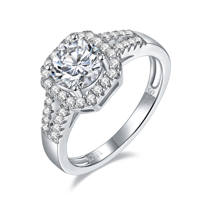 CARISSIE round moissanite halo ring, angled view showing split shank pavé band and octagonal frame