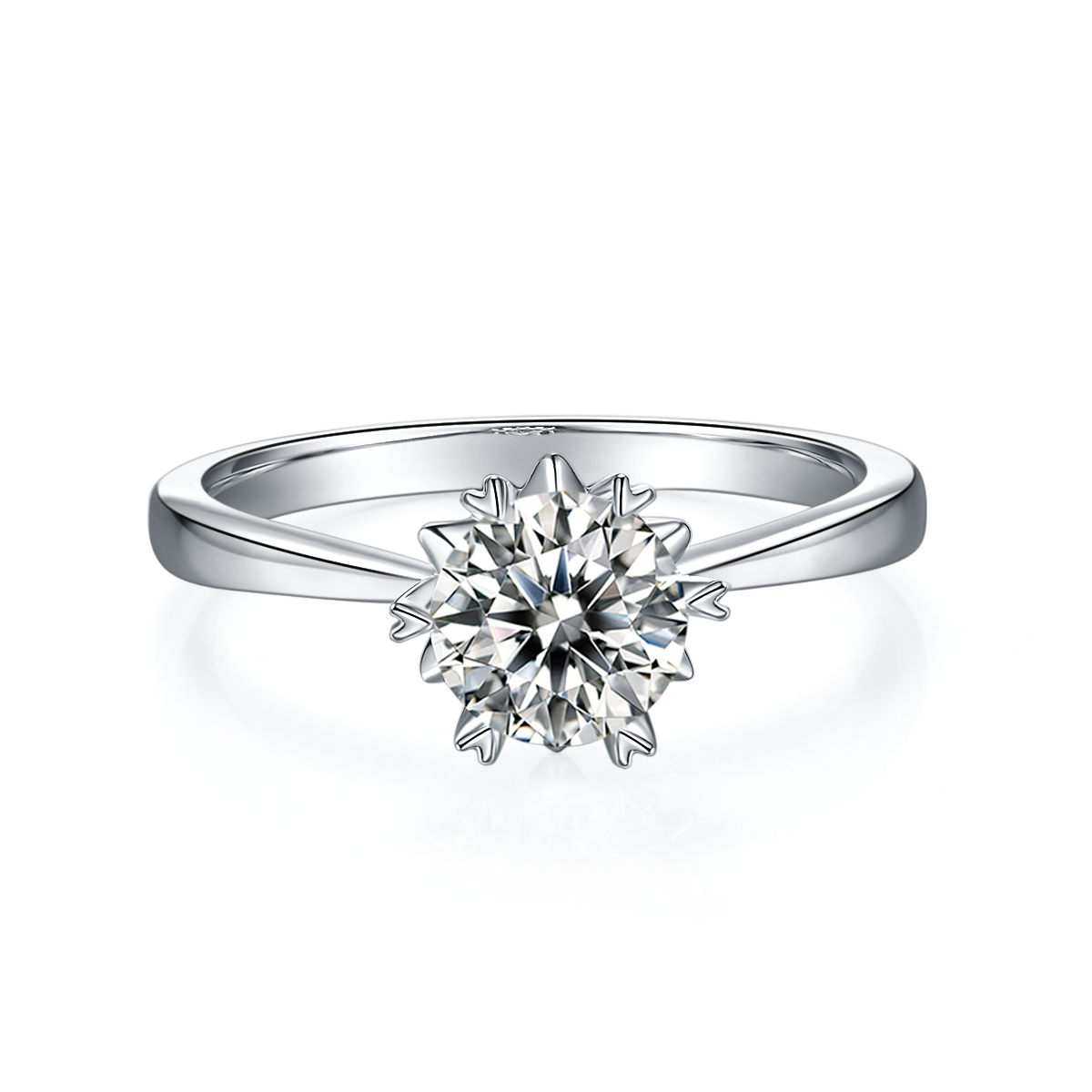 CARISSIE round moissanite solitaire ring, front view displaying the starburst prongs surrounding the brilliant center stone