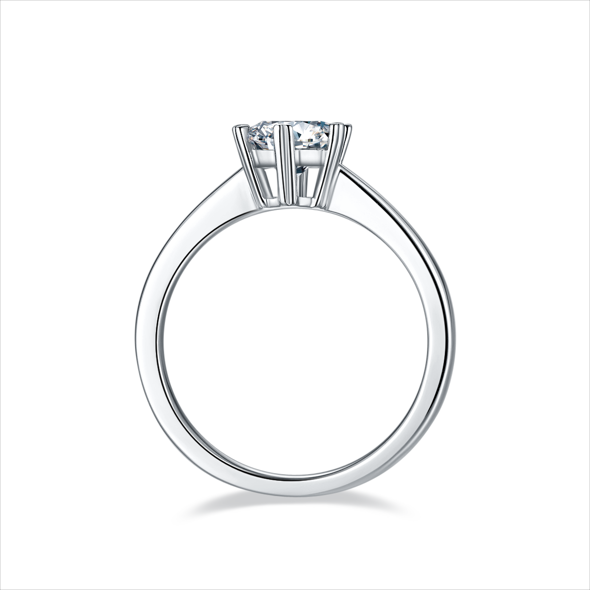 CARISSIE round moissanite solitaire ring, side profile revealing the elevated prongs and sleek design of the silver band