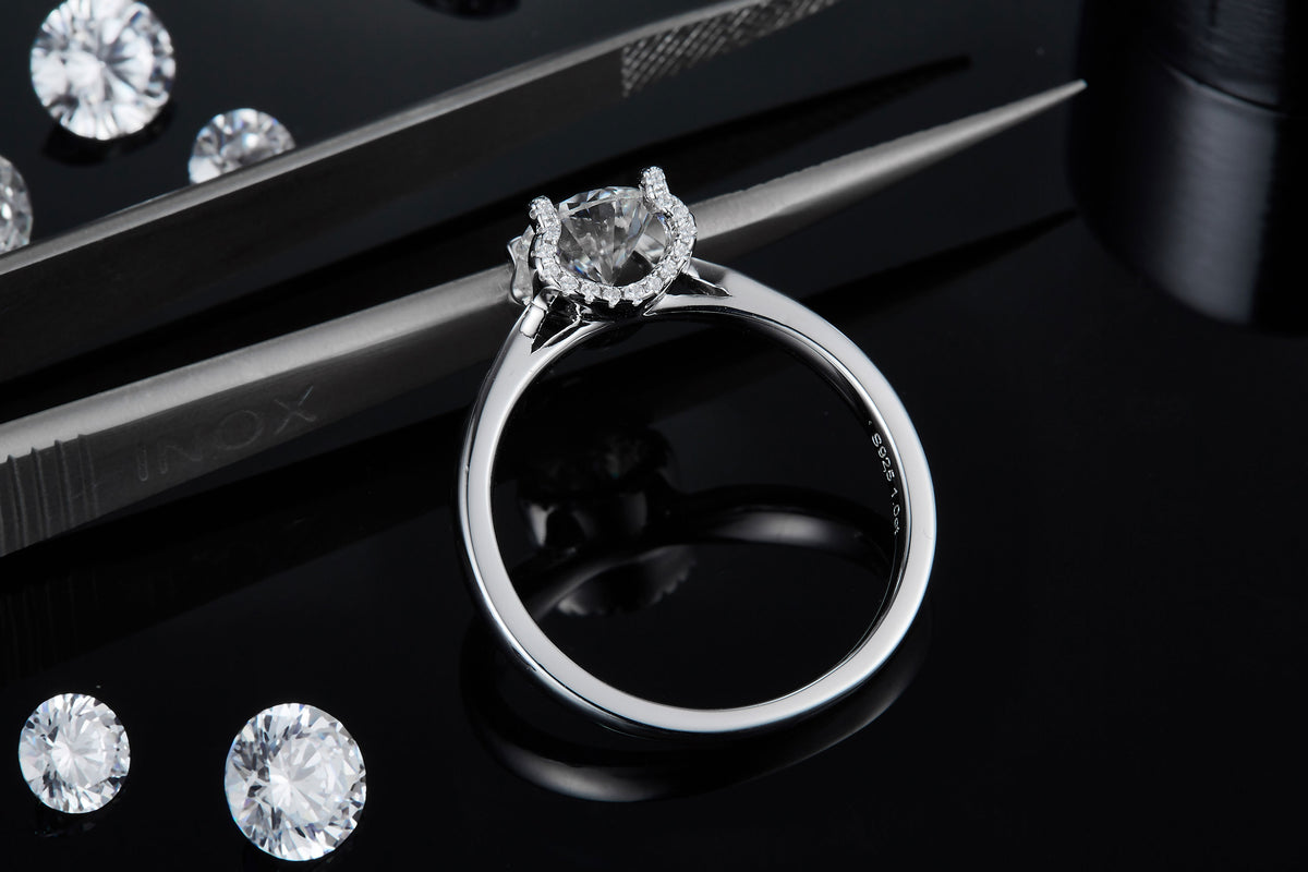 CARISSIE round moissanite solitaire ring, side profile revealing inner gallery details and S925 stamp on polished band