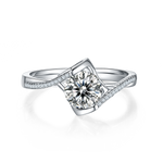 CARISSIE round moissanite bezel ring, top-down perspective showcasing the geometric setting and brilliant center stone.