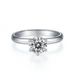 CARISSIE round moissanite solitaire ring, front view displaying the brilliant center stone in a six-prong setting