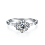 CARISSIE round moissanite solitaire ring, direct front view showing split shank band and side accent stones