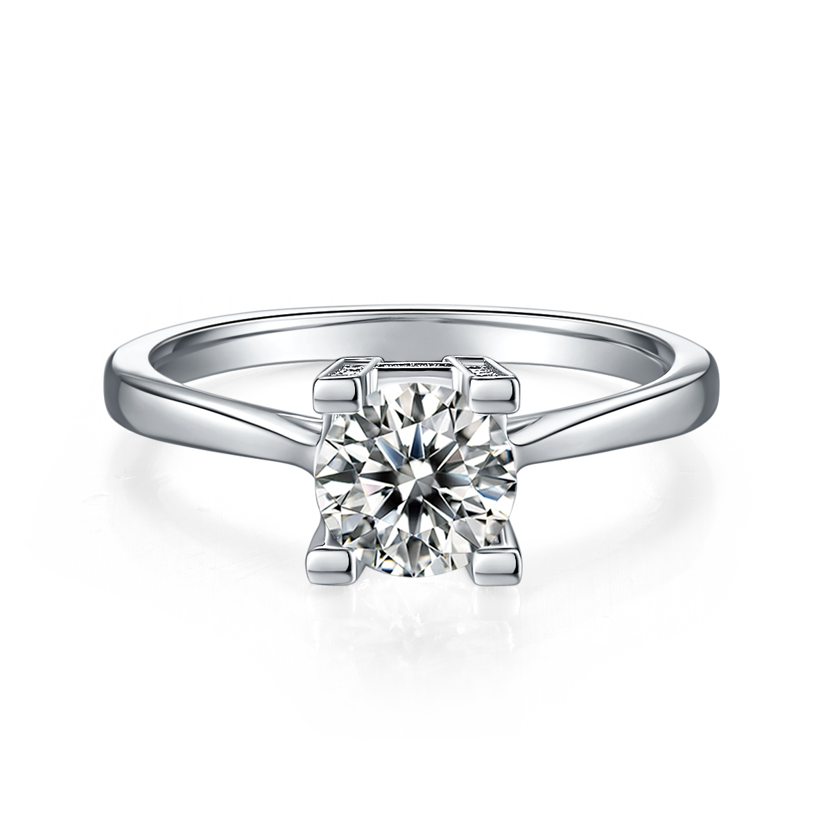 CARISSIE round moissanite solitaire ring, direct front view showcasing the brilliant cut center stone and sleek polished silver-tone band