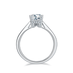 CARISSIE round moissanite solitaire ring, top-down perspective revealing the full circular shank and the unique H-set diamond head