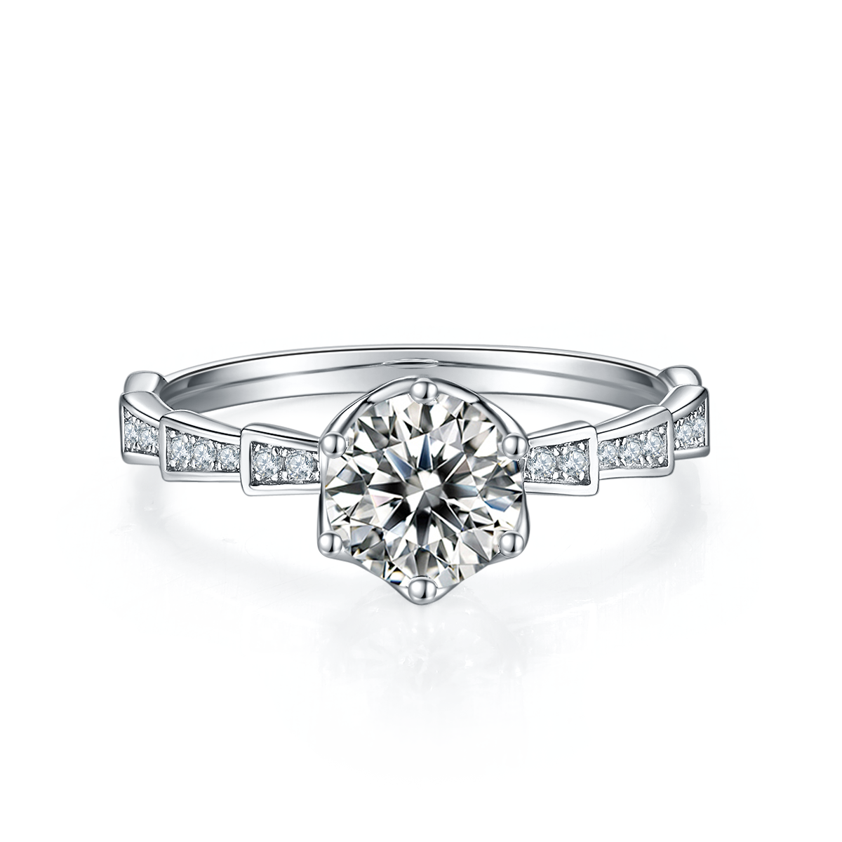 CARISSIE round moissanite solitaire ring, front view showcasing the brilliant cut center stone held by four prongs in silver-tone metal