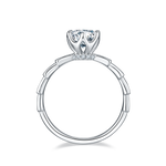 CARISSIE round moissanite solitaire ring, top-down perspective revealing the segmented shank design and smooth inner band finish