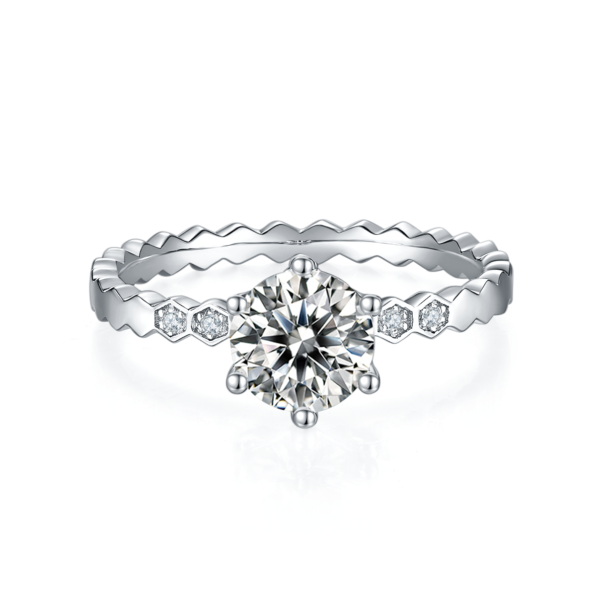 CARISSIE round moissanite solitaire ring, front view showcasing the six-prong setting and interlocking metal texture