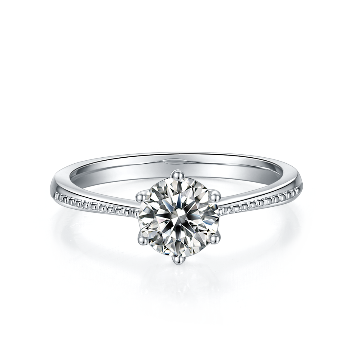 CARISSIE round moissanite solitaire ring, front perspective showing the brilliant center stone and milgrain detail