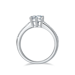 CARISSIE round moissanite solitaire ring, side profile displaying the gallery rail and high-polish metal finish