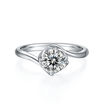 CARISSIE round moissanite solitaire ring, front view displaying curved silver-tone band and sparkling center gemstone