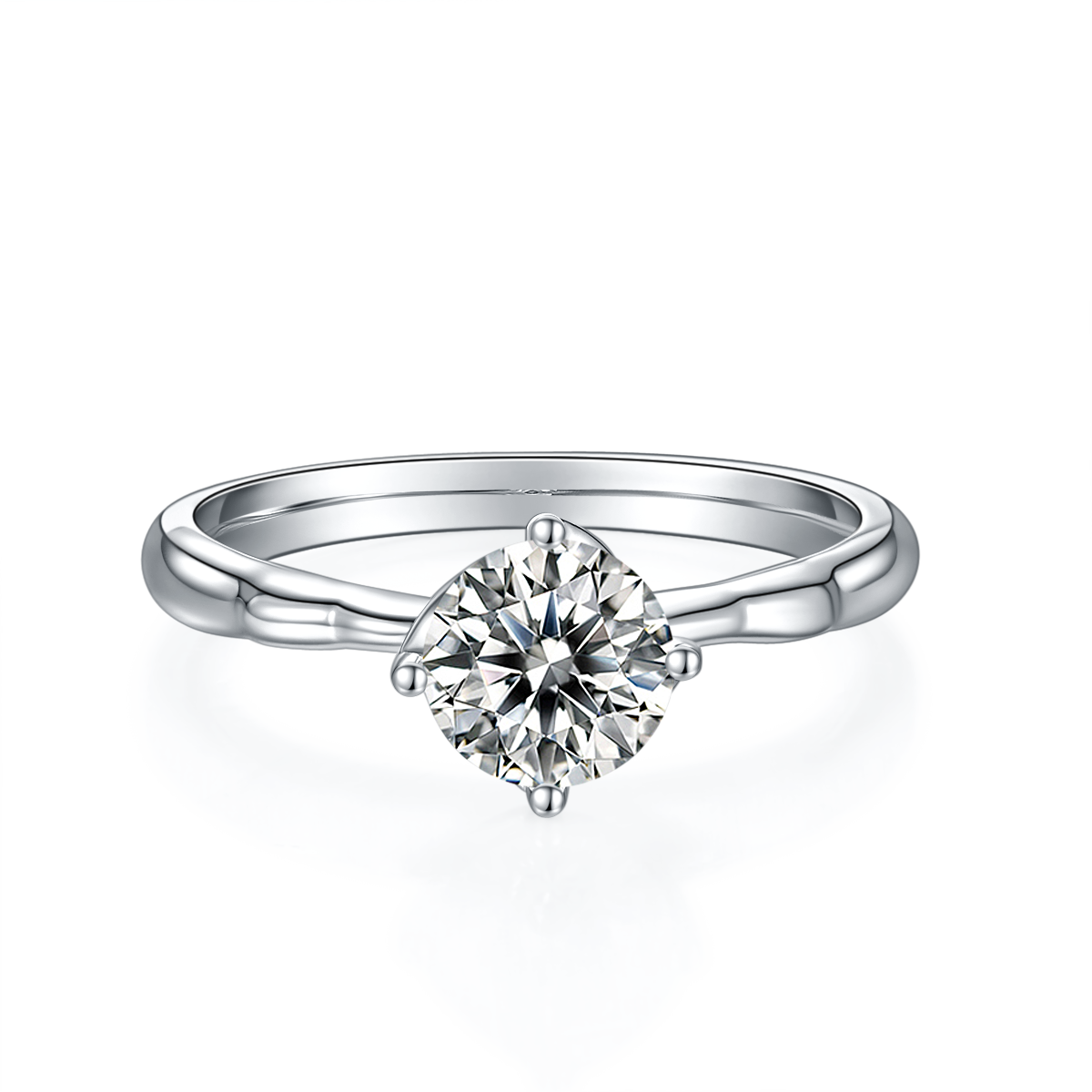 CARISSIE round moissanite solitaire ring, top-down view showing the brilliant-cut center stone and four-prong setting