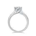 CARISSIE round moissanite solitaire ring, side profile revealing inner band structure and parallel lines