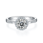 CARISSIE round moissanite halo engagement ring, top-down view showcasing the brilliant center stone and surrounding diamond halo