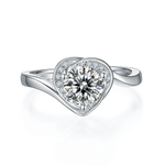 CARISSIE round moissanite engagement ring, top-down view showing the central stone surrounded by pave-set accent stones