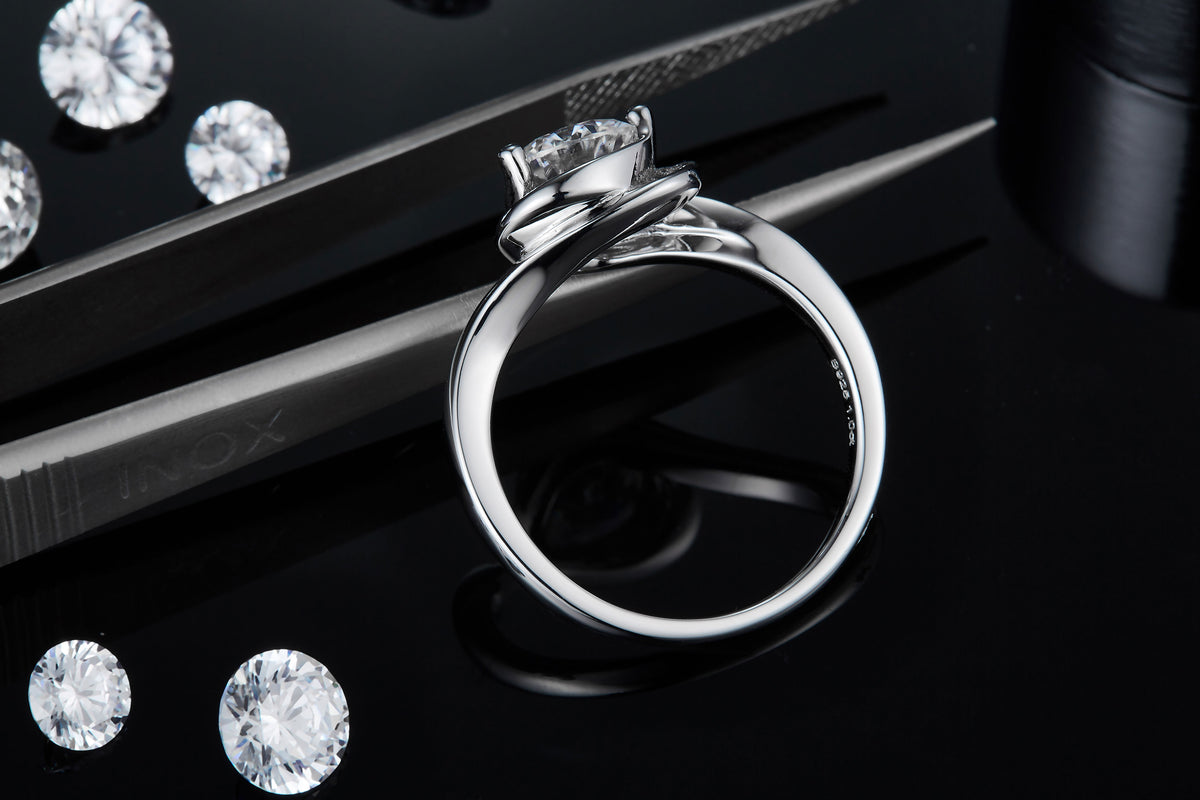 CARISSIE round moissanite engagement ring, bottom angle displaying the inner band curvature and metal finish details