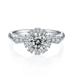 CARISSIE round moissanite halo ring, top-down view showcasing the central stone surrounded by a regal diamond halo