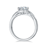 CARISSIE round moissanite solitaire ring, bottom profile showing the smooth white metal interior and prong base