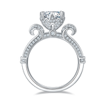 CARISSIE round moissanite solitaire ring, bottom view revealing the inner band structure and detailed pavé work