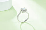 CARISSIE round moissanite halo ring, side perspective demonstrating the ring's height and delicate prong setting