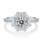 CARISSIE round moissanite halo ring, direct front view displaying the symmetrical flower-inspired stone arrangement