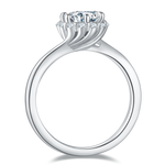 CARISSIE round moissanite halo engagement ring, side profile revealing the open gallery and smooth polished interior band