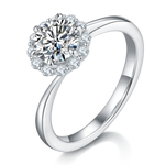 CARISSIE round moissanite halo engagement ring, angled view showing split shank band and brilliant center stone