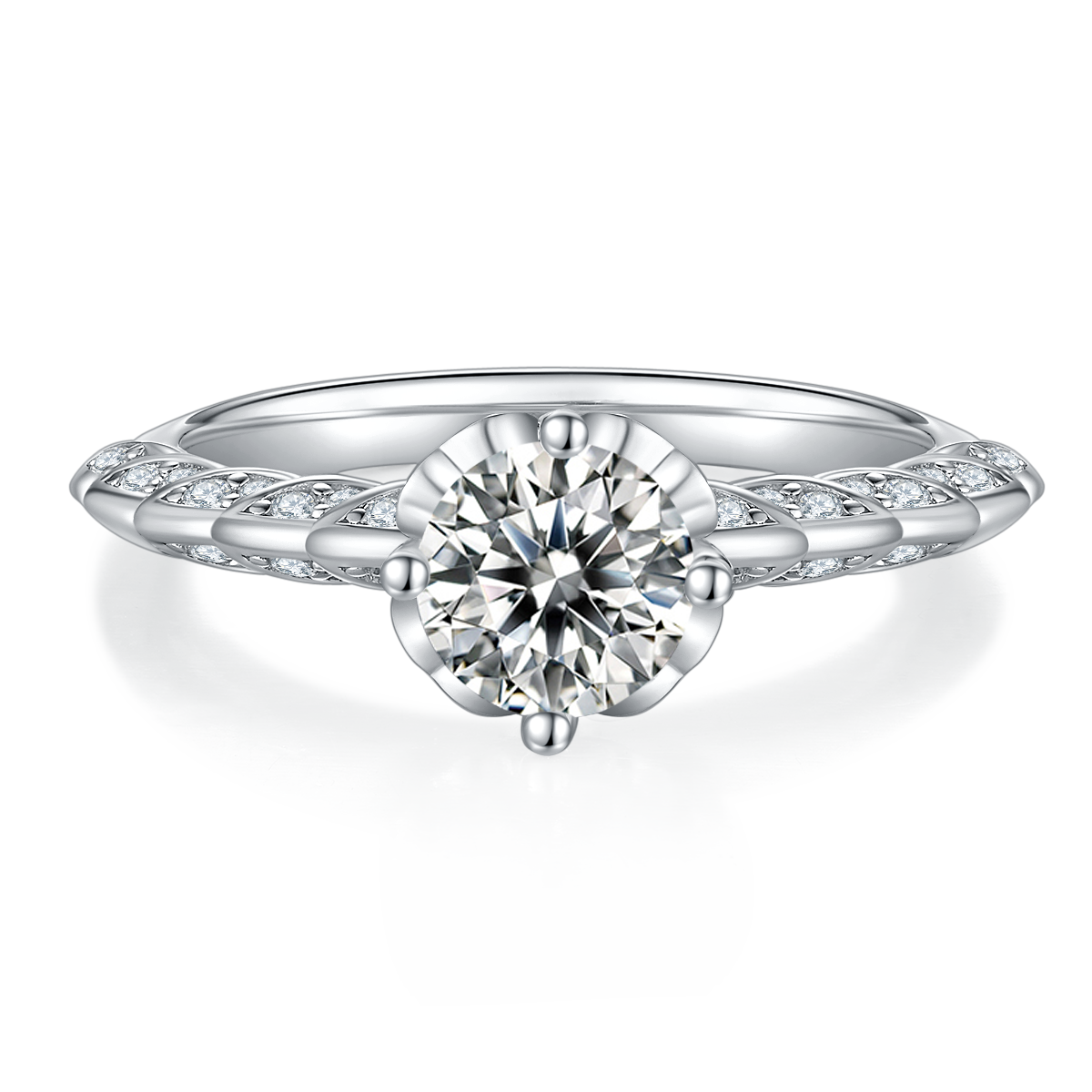 CARISSIE round moissanite solitaire ring, low front angle highlighting the split shank design and four-prong setting