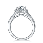 CARISSIE round moissanite halo engagement ring, side profile revealing open gallery structure and inner band