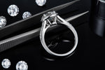 CARISSIE round moissanite halo ring, detailed close-up displaying the inner band structure and prong craftsmanship