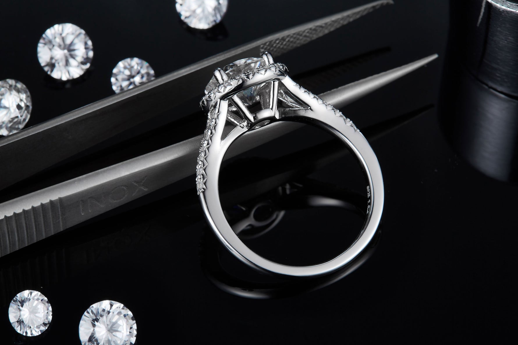 CARISSIE round moissanite halo ring, detailed close-up displaying the inner band structure and prong craftsmanship