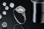 CARISSIE round moissanite halo engagement ring, artistic lifestyle shot on dark background with scattered loose gemstones