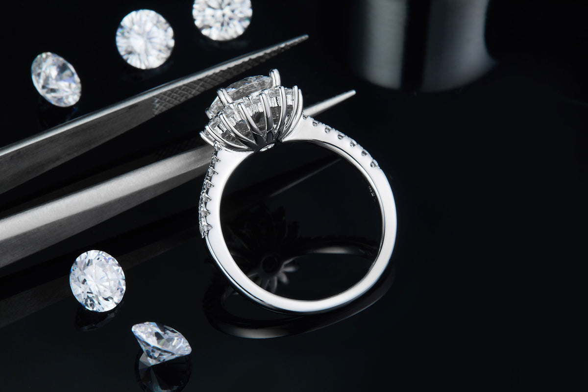 CARISSIE round moissanite halo engagement ring, detailed close-up of the gallery rail and inner band craftsmanship.