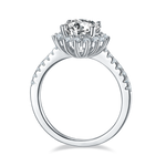 CARISSIE round moissanite halo engagement ring, front view displaying the cathedral setting structure and prong details.
