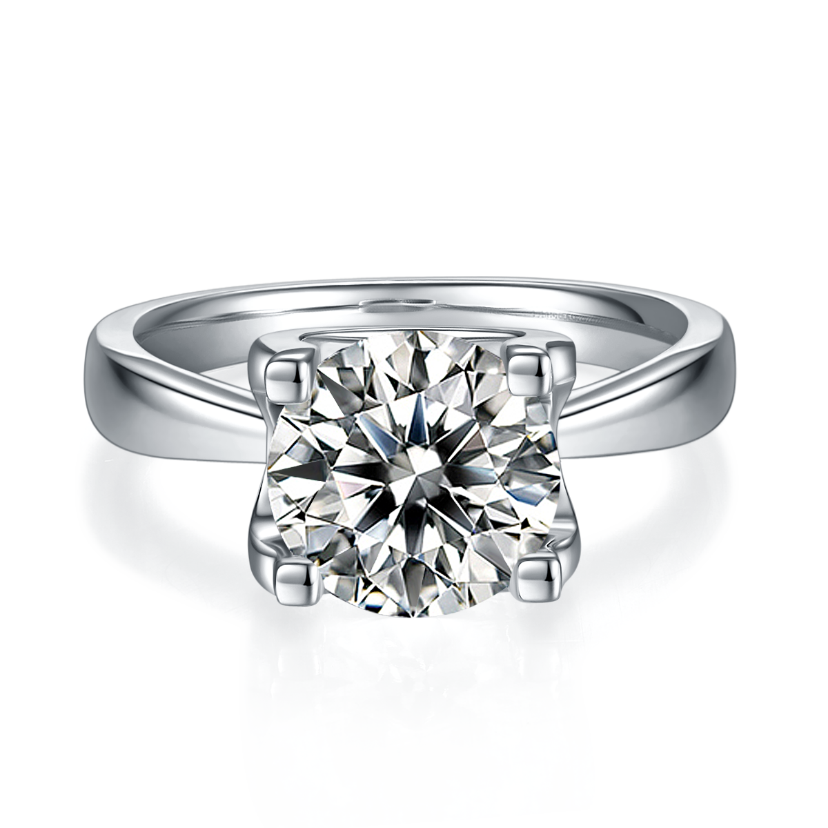 CARISSIE round moissanite solitaire ring, front view highlighting the brilliant-cut center stone in a classic prong setting