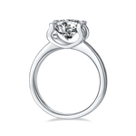 CARISSIE round moissanite solitaire ring, bottom view displaying the smooth interior of the tapered silver-tone shank