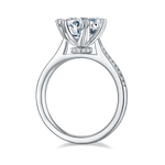 CARISSIE round moissanite wedding ring, side profile showing the inner gallery and hidden accent stones under the head