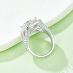 CARISSIE round moissanite bridal ring, profile shot showing the smooth inner band and detailed under-gallery structure