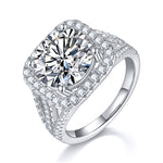 CARISSIE round moissanite halo ring, angled view highlighting the brilliant center stone and split shank band