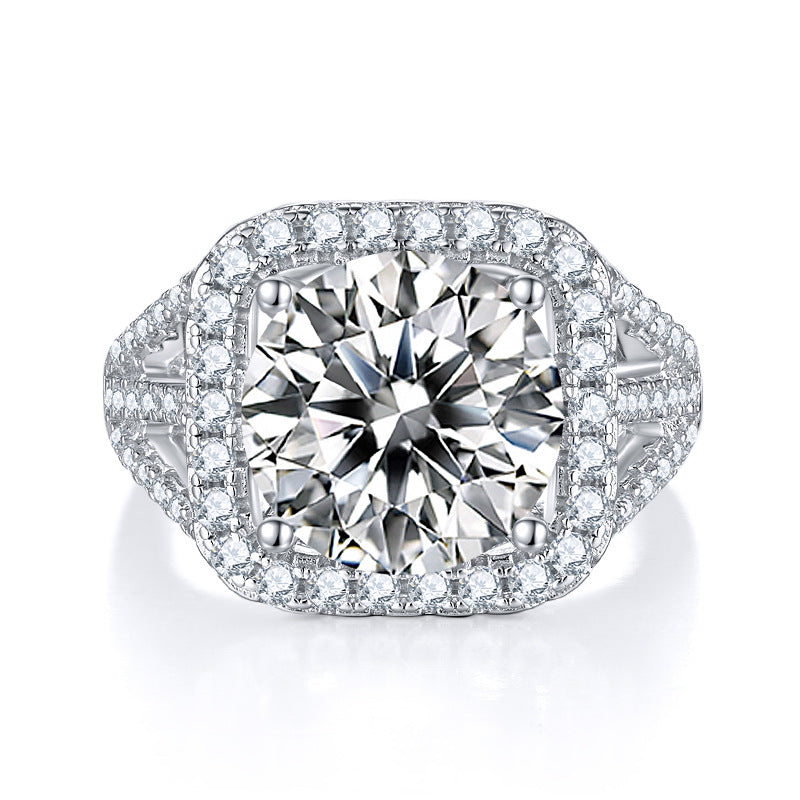 CARISSIE round moissanite engagement ring, top-down view displaying the double halo and pavé encrusted shoulders