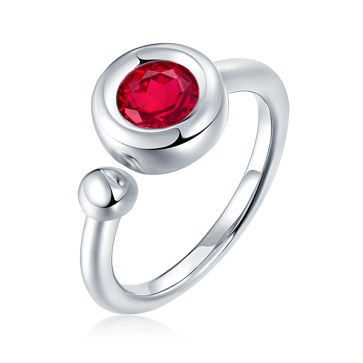 CARISSIE round moissanite bezel ring, isolated studio shot of red stone emphasizing spherical bead detail