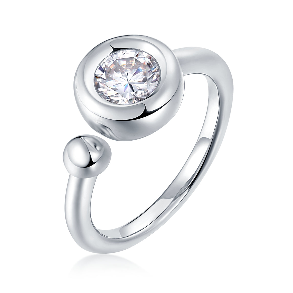 CARISSIE round moissanite bezel ring, detailed angle of clear center stone showing brilliance and metal finish