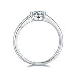 CARISSIE round moissanite engagement ring, side profile displaying the sleek band tapering into the modern bezel head