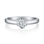 CARISSIE oval moissanite bezel ring, front view highlighting the 4x6mm stone brilliance and smooth setting