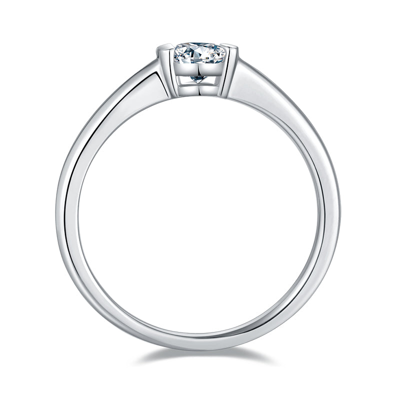 CARISSIE oval moissanite bezel ring, top-down profile revealing the tapered band width and low-profile design