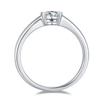 CARISSIE oval moissanite bezel ring, top-down profile revealing the tapered band width and low-profile design