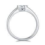CARISSIE heart moissanite bezel ring, side profile displaying the low-profile setting and tapered polished shank.